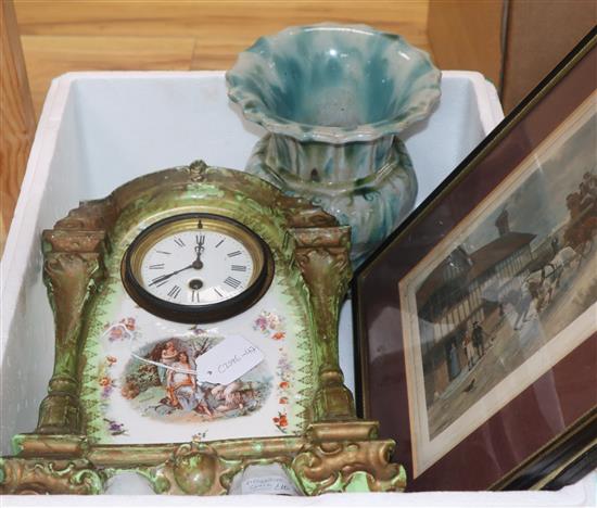 A pottery painted timepiece, a vase and two prints